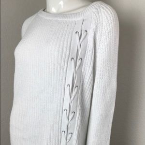 White sweater with front tie detail